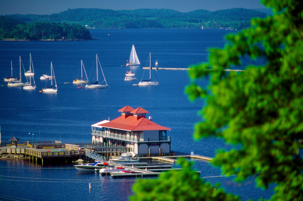 The Boathouse restaurant sits in the azure water of Lake Champlain